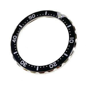 Vostok Lünette aus Edelstahl mit Alu‑Insert und SuperLumiNova Marke, inkl. Feder