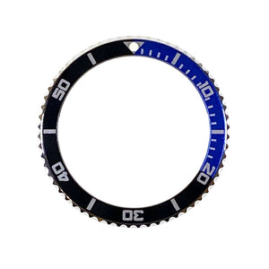 Vostok Lünette aus Edelstahl mit schwarz/blauem Alu‑Insert und SuperLumiNova Marke inkl. Feder