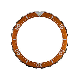 Vostok Lünette aus Edelstahl mit Alu‑Insert und SuperLumiNova Marke, inkl. Feder