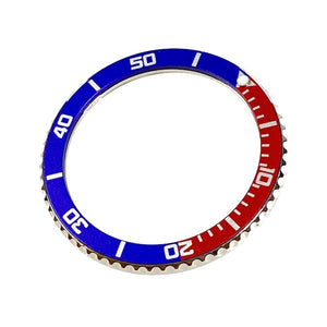 Vostok Pepsi Lünette aus Edelstahl mit Alu‑Insert und SuperLumiNova Marke, inkl. Feder