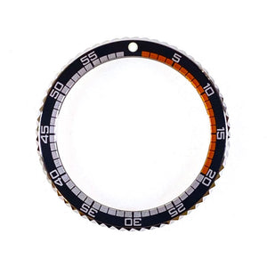 Vostok Lünette aus Edelstahl mit Alu‑Insert und SuperLumiNova Marke, inkl. Feder