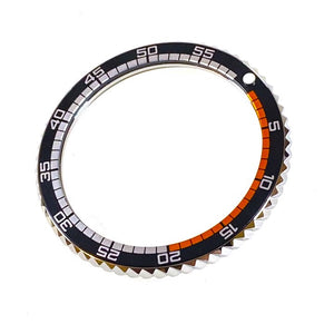 Vostok Lünette aus Edelstahl mit Alu‑Insert und SuperLumiNova Marke, inkl. Feder