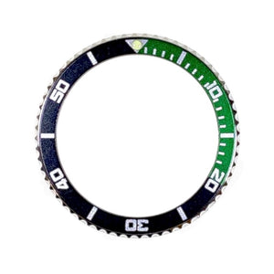 Vostok Lünette aus Edelstahl mit schwarz/grünem Alu‑Insert und SuperLumiNova Marke inkl. Feder