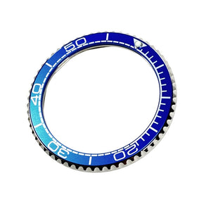 Vostok Lünette aus Edelstahl mit Alu‑Insert und SuperLumiNova Marke, inkl. Feder