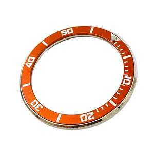 Vostok bezel made of stainless steel with aluminum insert and SuperLumiNova mark, incl. spring