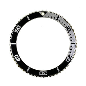 Vostok bezel made of stainless steel with aluminum insert and SuperLumiNova including spring