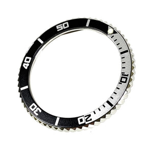 Vostok bezel made of stainless steel with aluminum insert and SuperLumiNova including spring