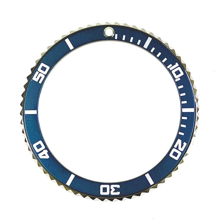 Vostok bezel made of stainless steel with aluminum insert and SuperLumiNova mark, incl. spring
