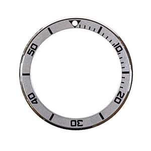 Vostok bezel made of stainless steel with aluminum insert and SuperLumiNova mark, incl. spring