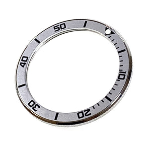 Vostok bezel made of stainless steel with aluminum insert and SuperLumiNova mark, incl. spring