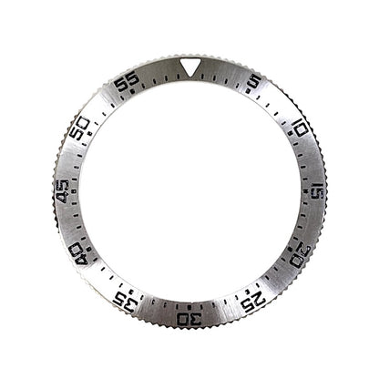 Vostok bezel i rustfrit stål med sunburst børstet finish og SuperLumiNova, inklusiv fjeder